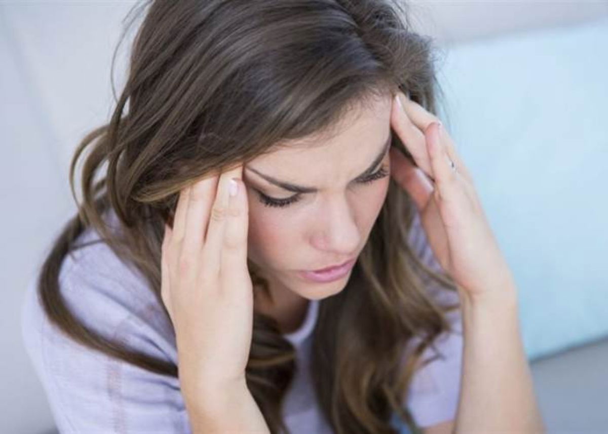 Mujer dolor cabeza