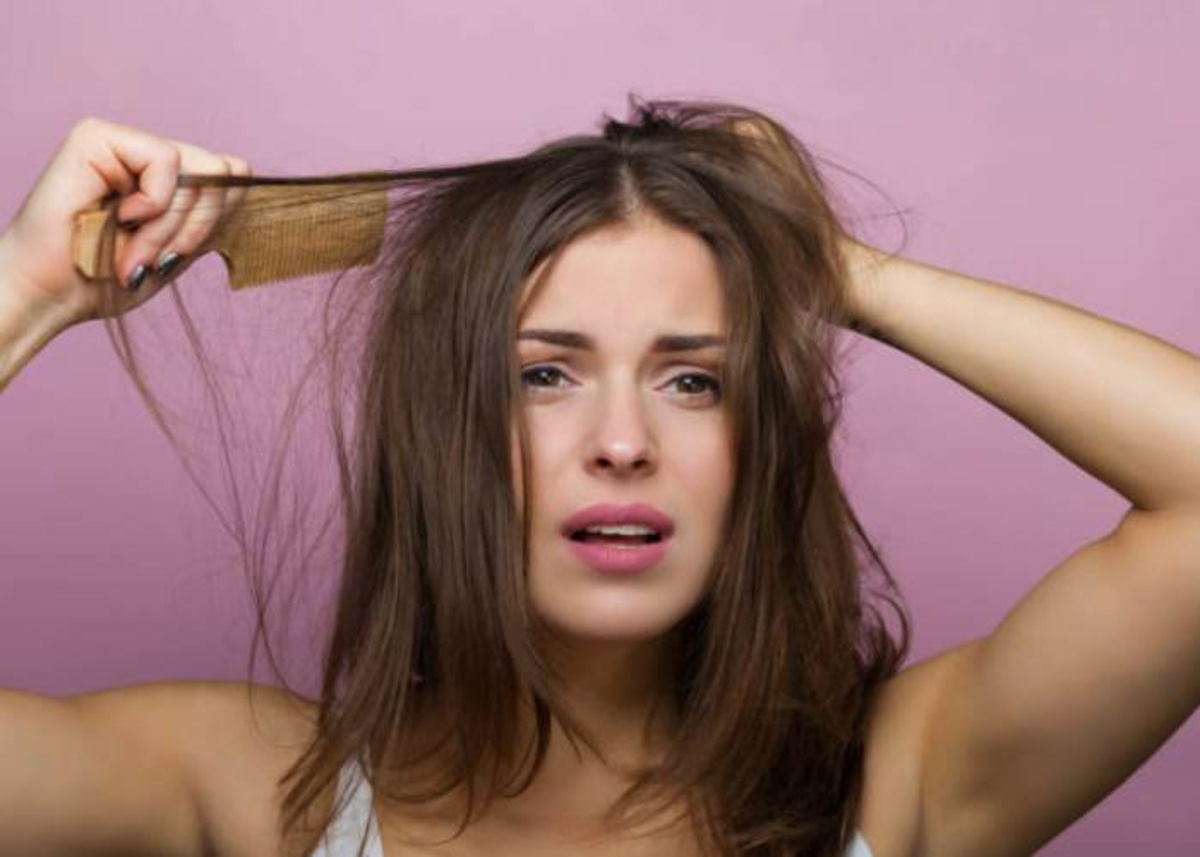 Mujer cabello dañado