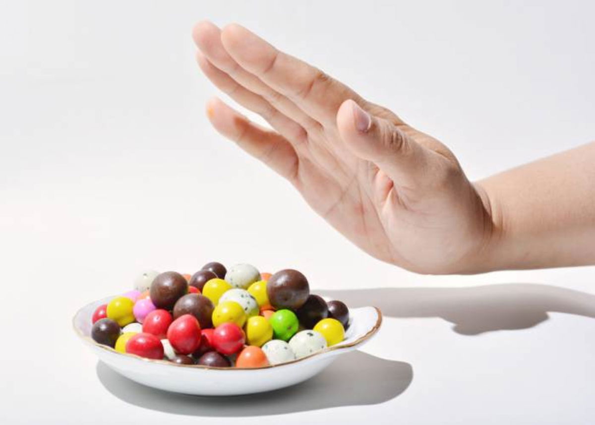 Persona negando dulces