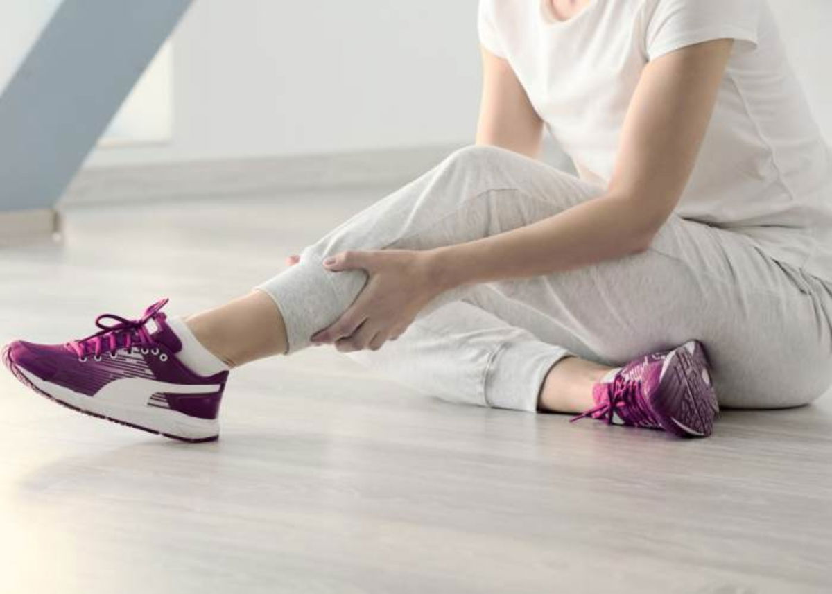 Persona con sobrecarga muscular