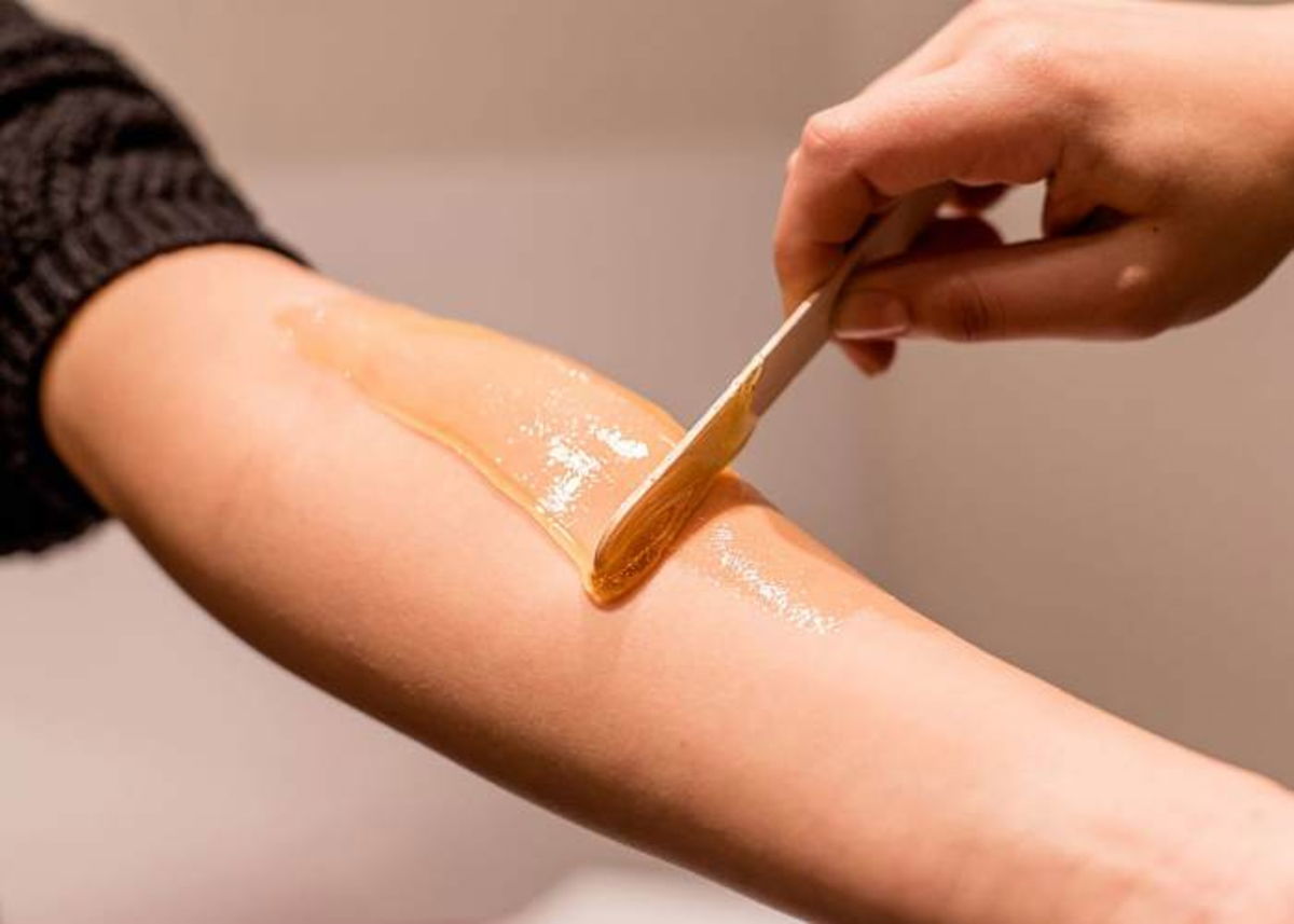 Brazo con crema depilatoria