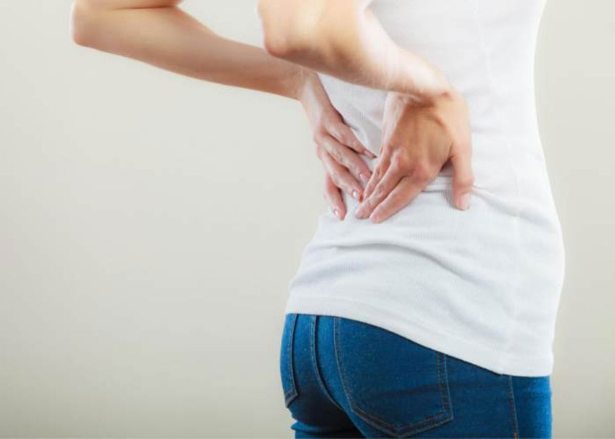 Persona con dolor espalda