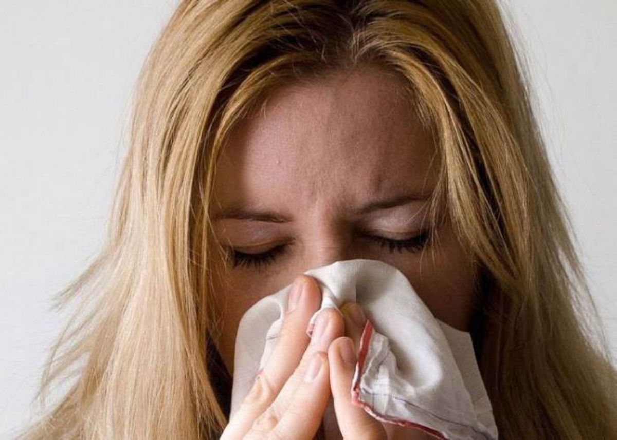 Mujer con nariz congestionada
